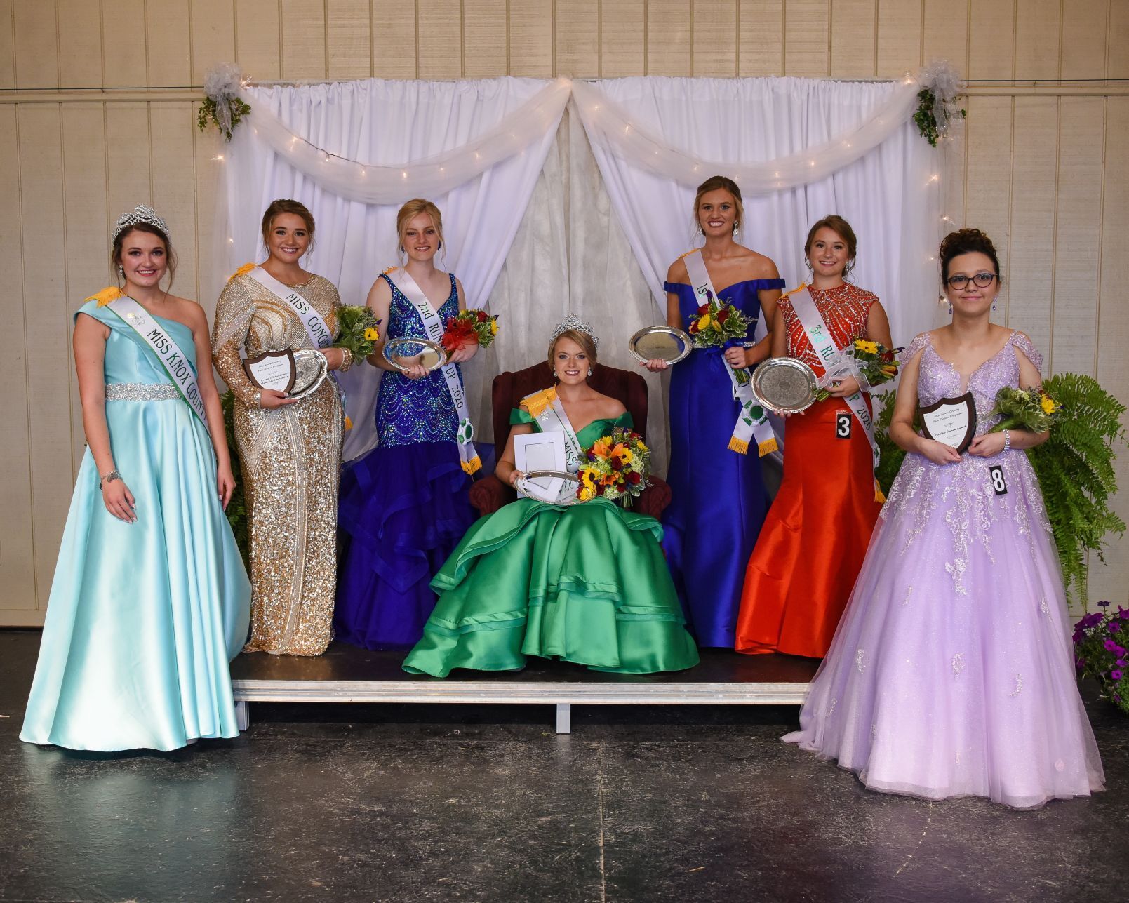 A queen and her court